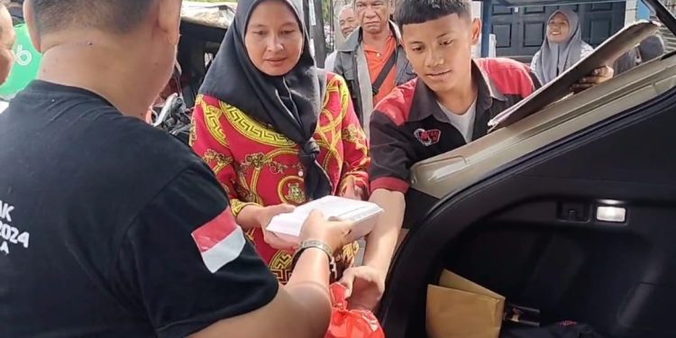 PT Macan Sejahtera Cahaya Bagikan 100 Nasi Kotak di Program Jumat Berkah